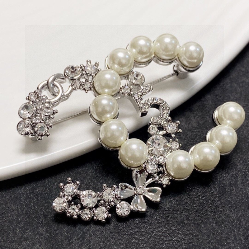 Ch**el brooches